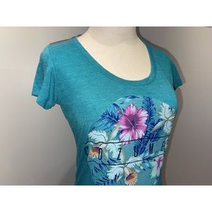 New. Turquoise “Cozumel” baby tee with cap sleeves.